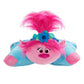 Plush toy with pink hair and a blue flower on a white background
