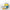 Minion-themed popcorn maker on a white tiled background