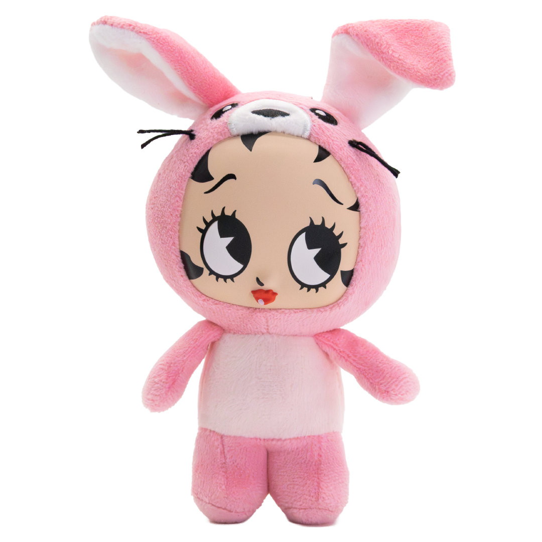 A pink plush toy doll with long bunny ears, a stitched face, and large cartoon eyes, shown against a plain white background.