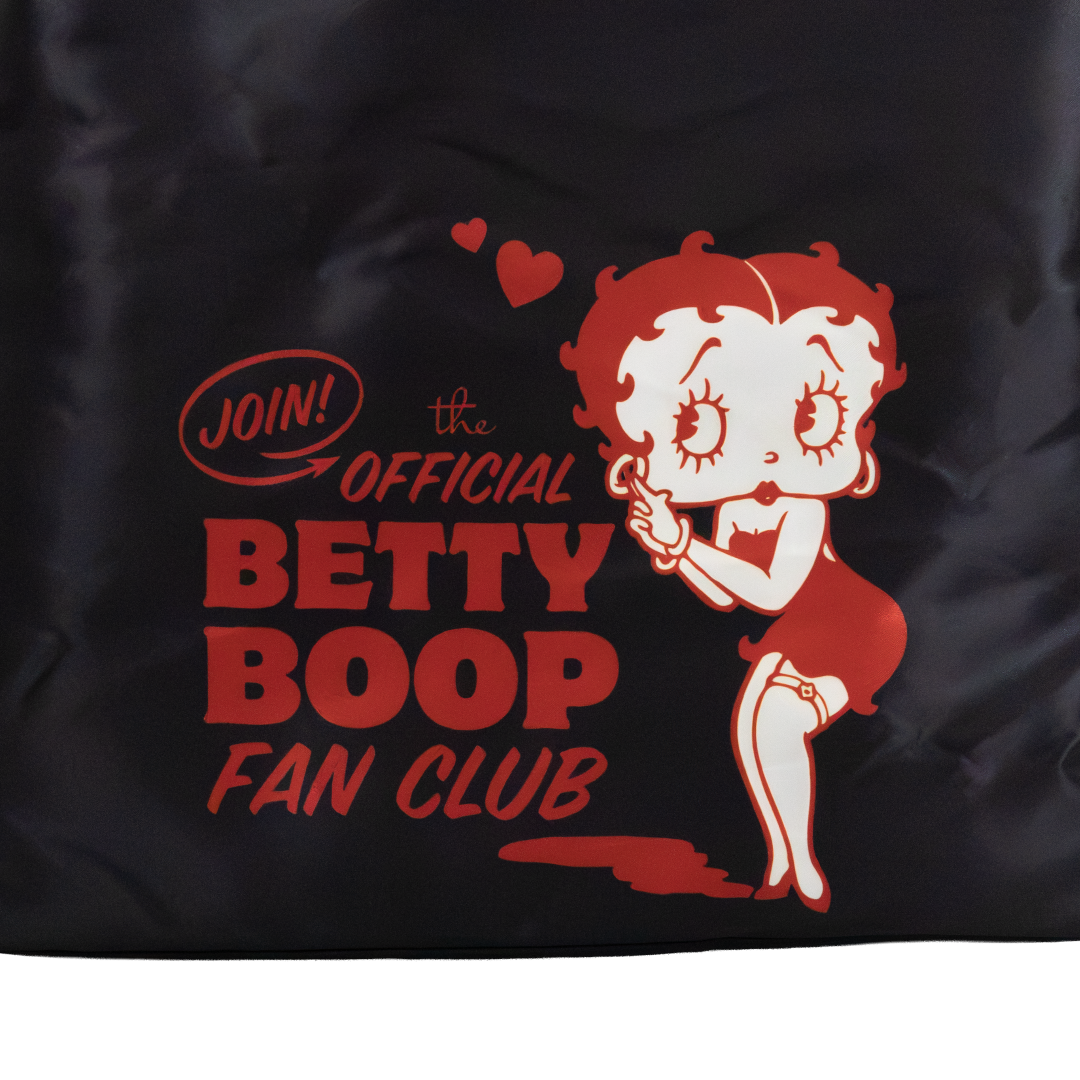 A black fabric item, likely a bag or pouch, featuring a red and white graphic of the iconic cartoon character Betty Boop with the text 'JOIN! the OFFICIAL BETTY BOOP FAN CLUB'.