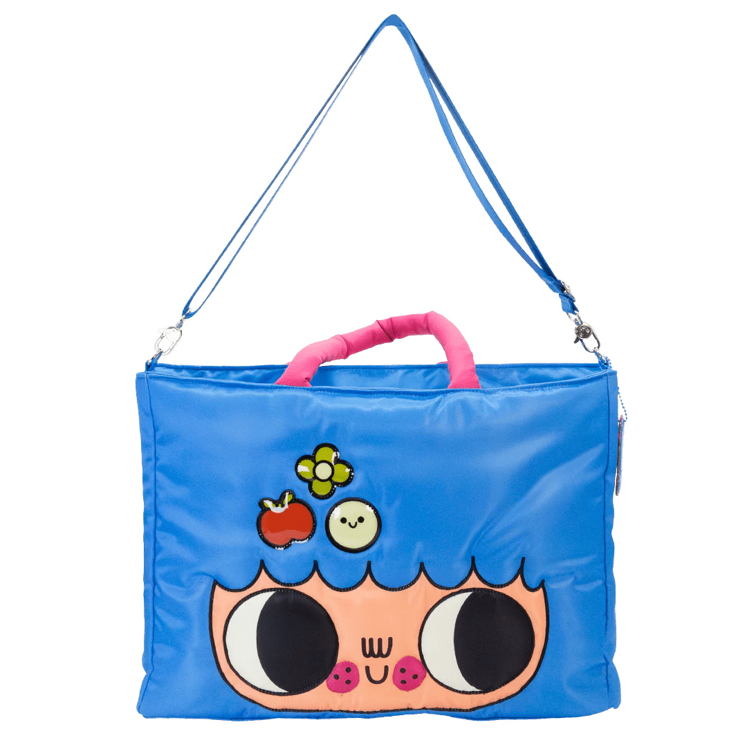 Blue bag with cartoon face design on a white background