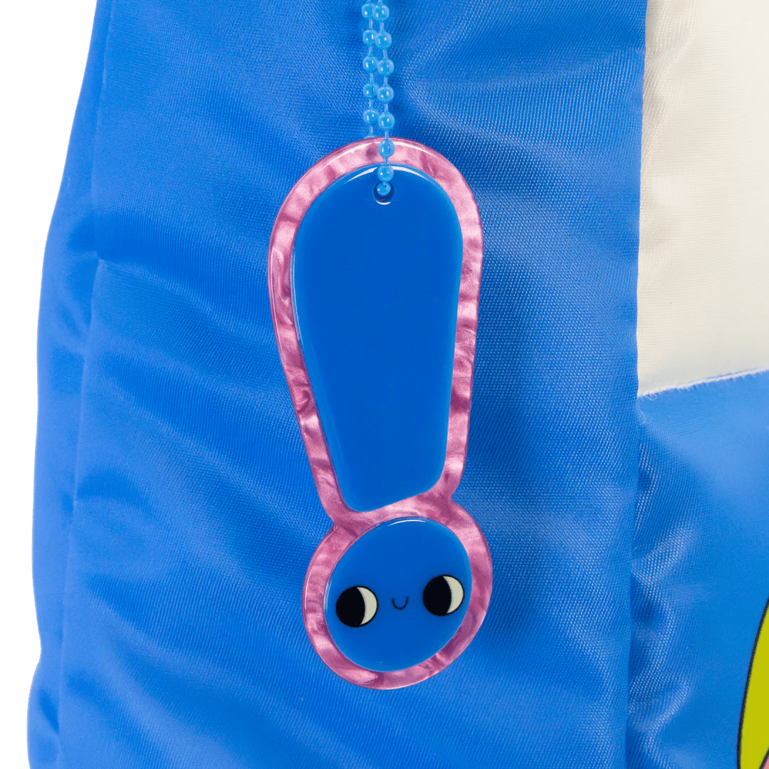 Blue backpack with a pink character-shaped zipper pull on a white background
