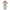 A stylized Pennywise the Clown collectible figure with messy orange hair, a white face, yellow eyes, and a gray body, shown against a plain white background.