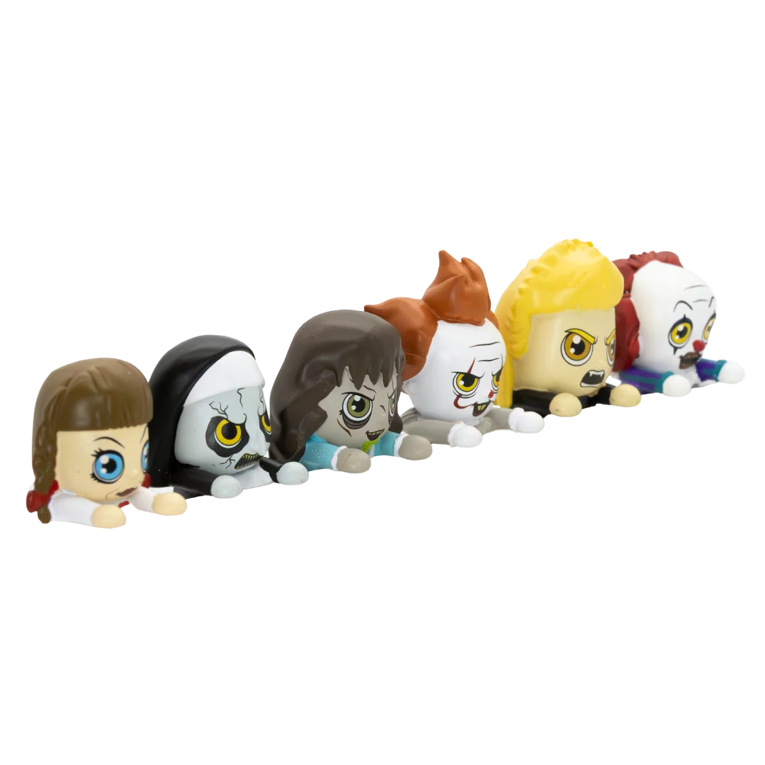 A row of six small stylized character figures with oversized heads and expressive eyes, arranged diagonally on a plain white background. The figures have different hair colors including brown, black, light blue, orange-brown, yellow, and red, and pale skin tones.