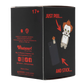 A black product box with red and white text and cartoon illustrations, photographed on a plain white background. The box shows the words 'JUST PEEL.