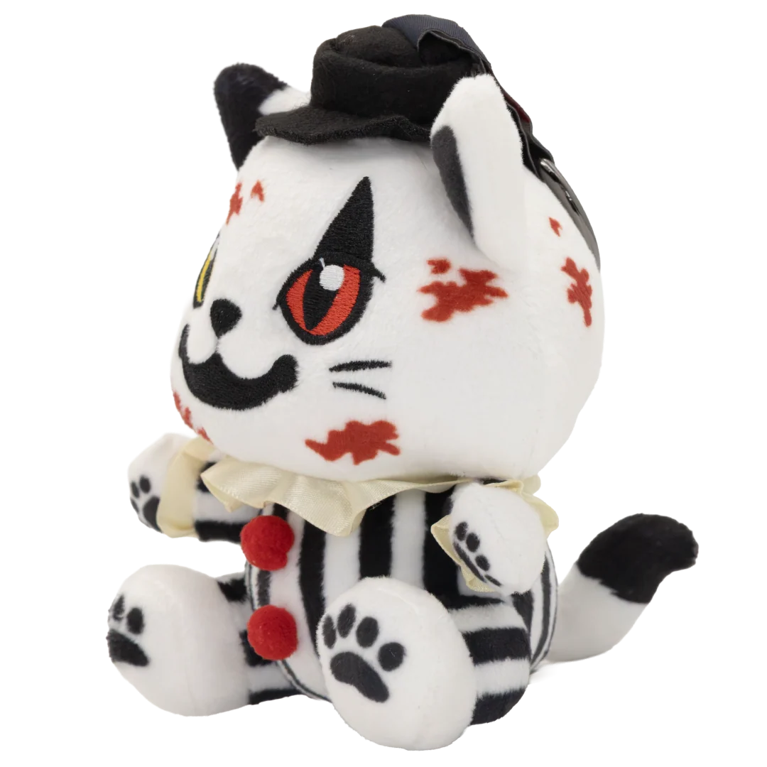A white plush cat toy dressed in a black-and-white striped clown outfit with red pom-poms, a cream ruffle collar, and a black hat, shown on a plain white background.