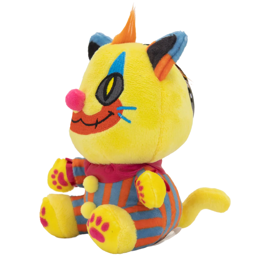 A yellow plush cat toy with blue, orange, pink, and black accents, sitting against a plain white background.