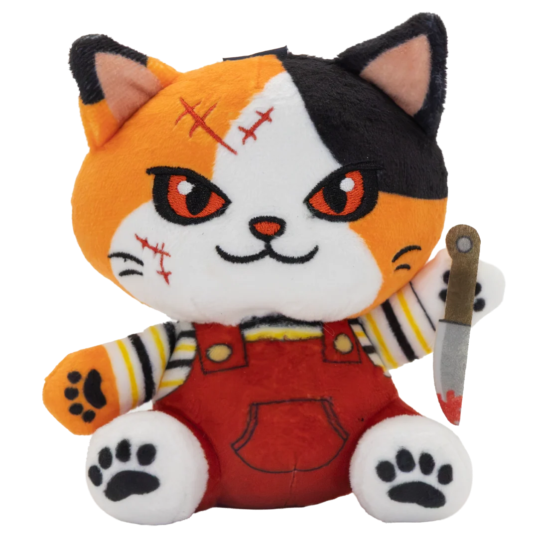 A plush toy of a horror character cat resembling Chucky, with orange, black, and white fur, red overalls, and holding a bloody knife, isolated on a white background.