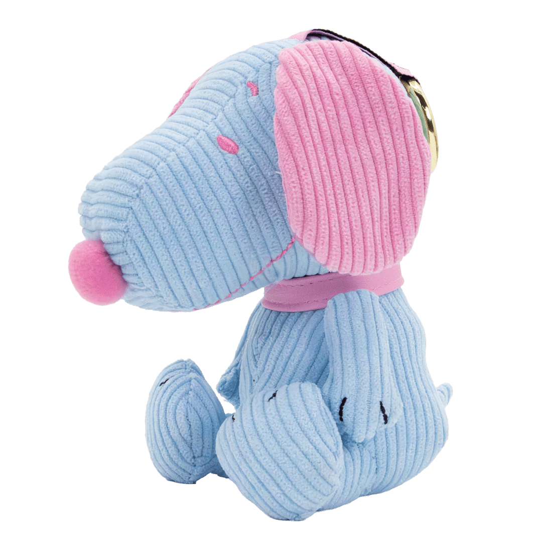 Blue and pink plush dog toy with a keychain on a white background