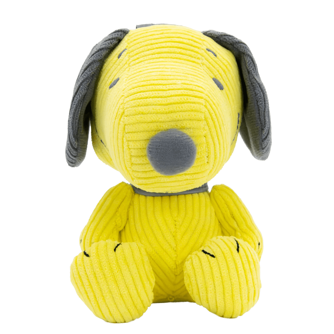 Yellow plush dog toy with gray ears on a white background