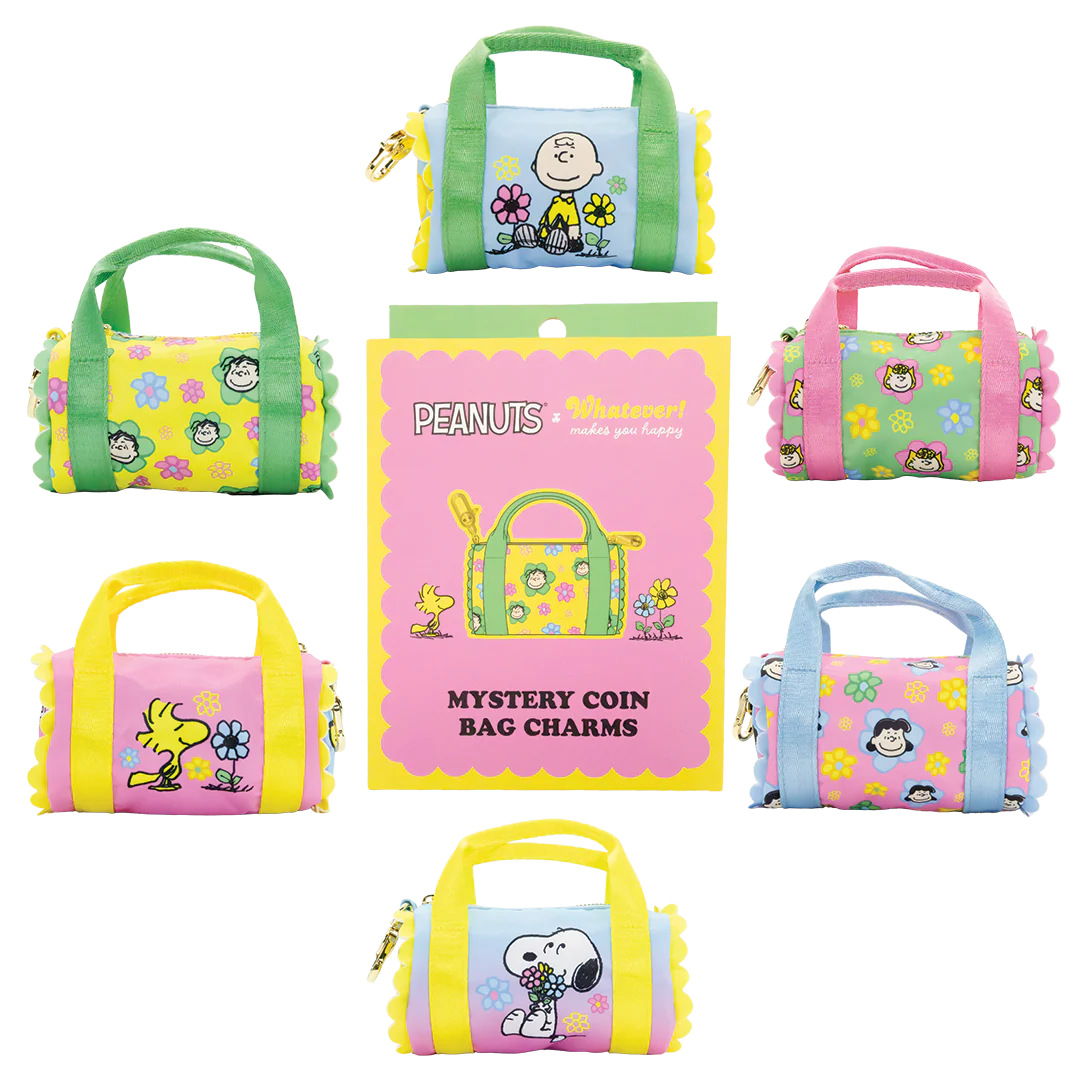 Set of colorful coin bag charms with Peanuts character designs on a white background.
