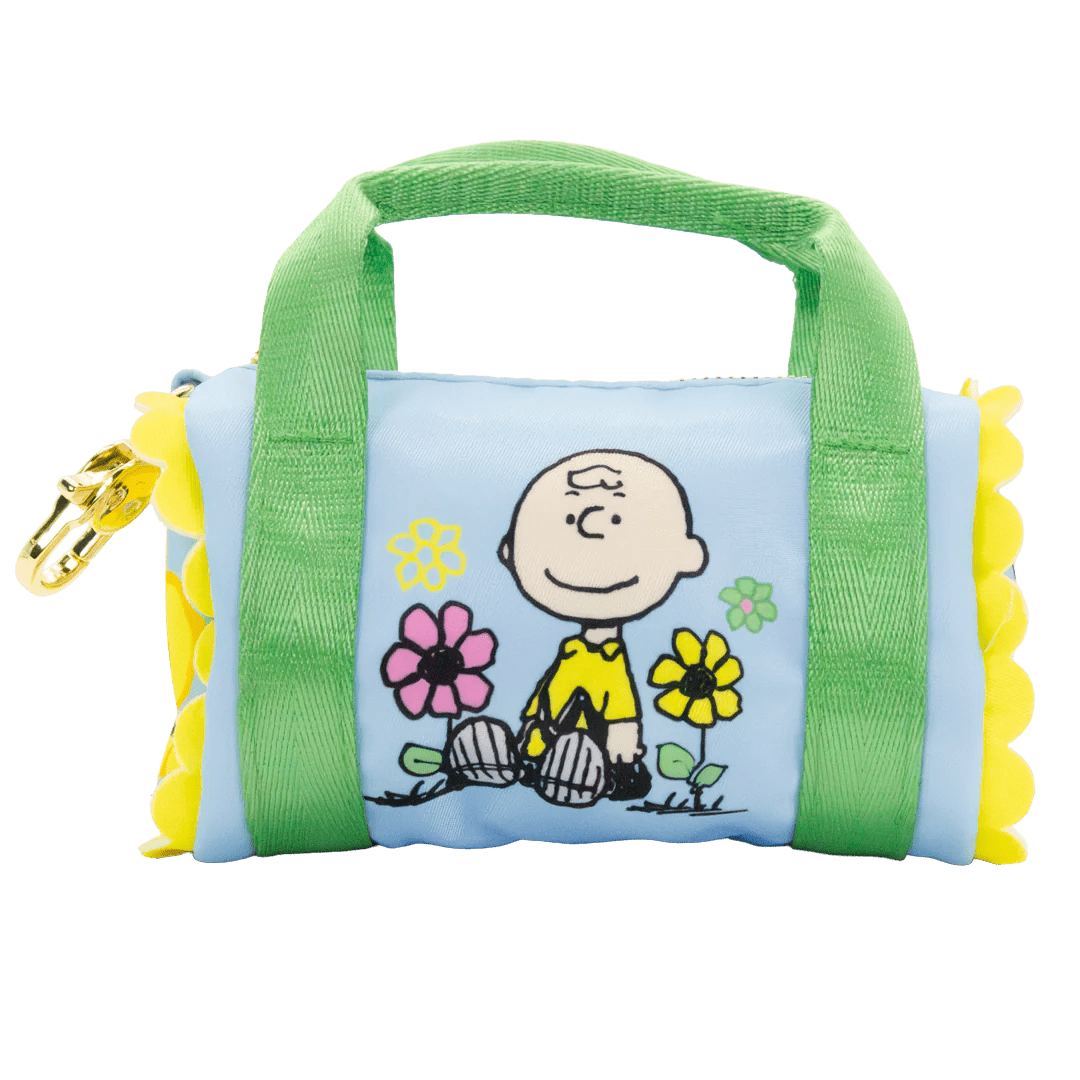 Small bag with a cartoon character and floral design on a white background