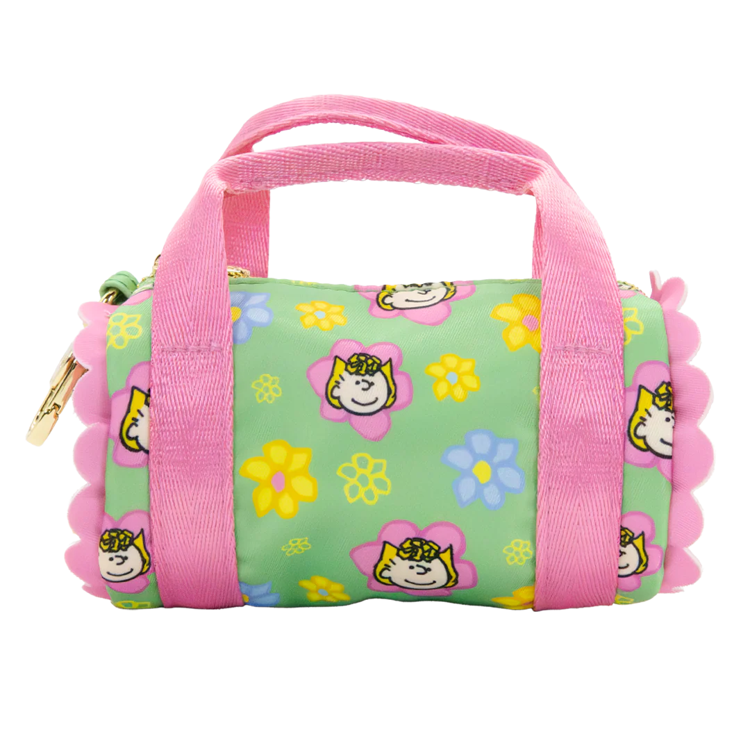 Children's bag with cartoon characters and flowers on a green background