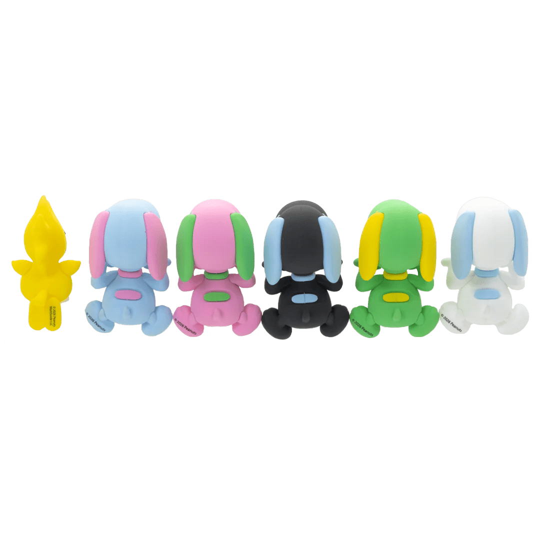 Set of colorful cartoon character figurines on a white background
