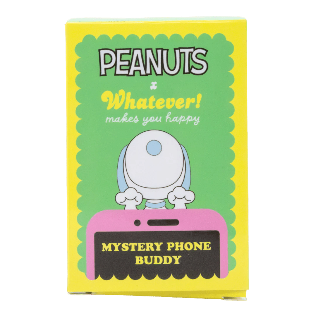 Peanuts-themed mystery phone buddy packaging with a cartoon character on a yellow and green background.