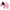 Pink plush dog toy with a visible label on a white background