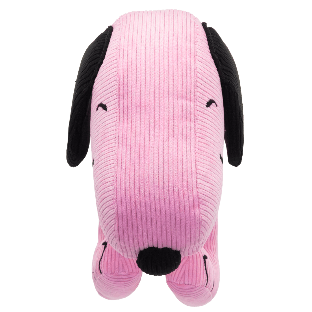 Pink plush dog toy with black ears and nose on a white background
