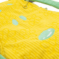 Yellow textured bag with green accents on a white background
