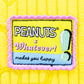 Embroidered patch with 'Peanuts' and 'Whatever! makes you happy' text on a yellow background