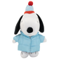A plush Snoopy doll wearing a light blue quilted puffer jacket, a striped blue and white knit hat with a red pom-pom, and a red knit scarf, set against a plain white background.