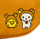 Two cartoon characters, a yellow chick and a white bear-like creature, on an orange background.