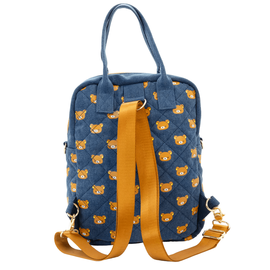 Blue backpack with bear pattern and yellow straps on a white background