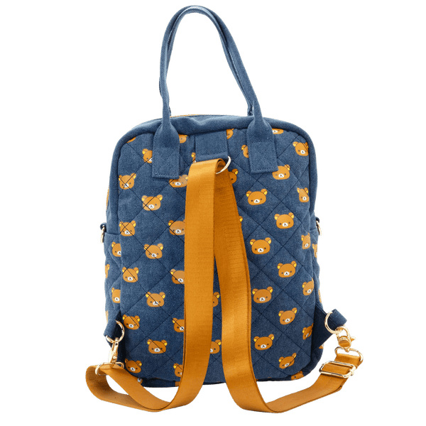 Blue backpack with bear pattern and yellow straps on a white background