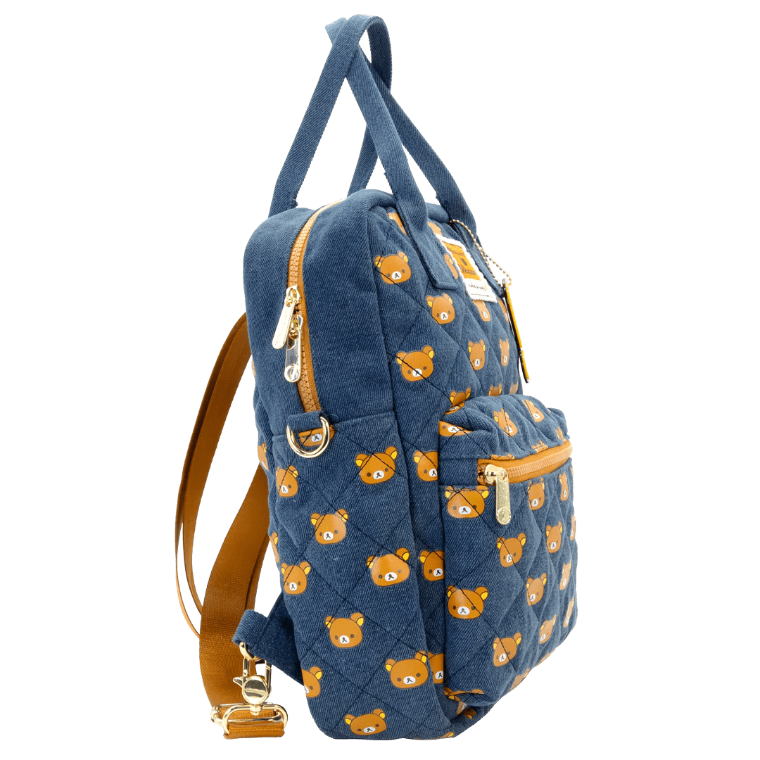 Blue backpack with bear pattern on a white background