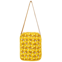 Yellow bag with teddy bear pattern on a white background