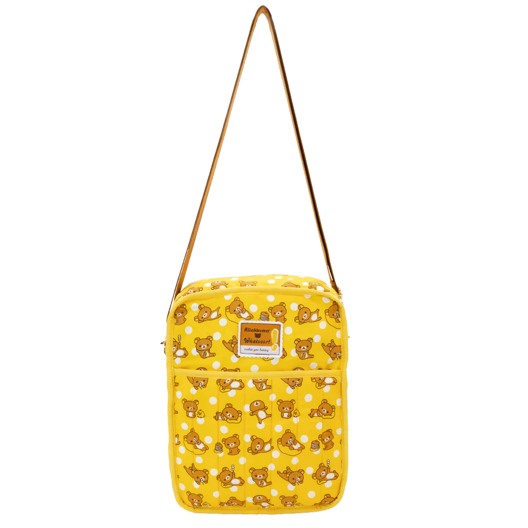 Yellow bag with teddy bear pattern on a white background