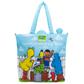 A Sesame Street canvas tote bag featuring the characters Big Bird, Oscar the Grouch, Cookie Monster, and Elmo on a light blue background with 'Good Friends. Great Times Since 1969' printed on the front.