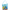 A light blue tote bag featuring a colorful print of Sesame Street characters, including Big Bird, Cookie Monster, and the Blue Monster, with the text 'Good Friends, Great Times Since 1969'. The bag has a light blue shoulder strap and handles, and a Sesame Street logo is visible on the front.
