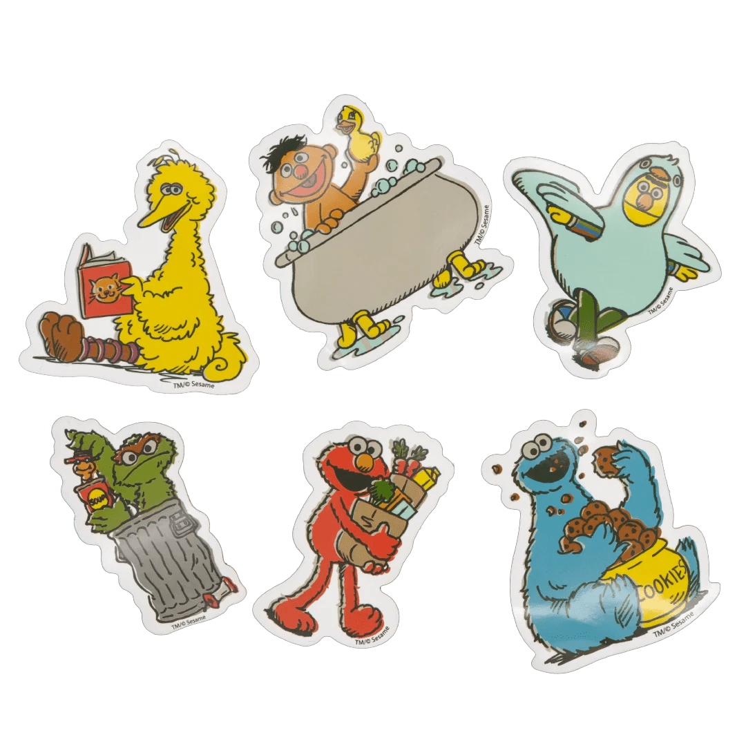 Six Sesame Street character stickers arranged on a plain white background: Big Bird reading, Ernie in a bathtub, Grover the pigeon flying, a green monster throwing trash, Elmo carrying groceries, and Cookie Monster eating cookies.