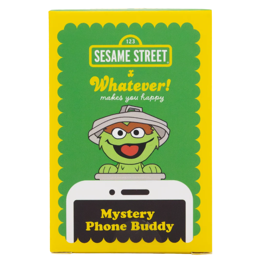 Sesame Street 'Mystery Phone Buddy' product box featuring Oscar the Grouch on a green and yellow background with a phone illustration.