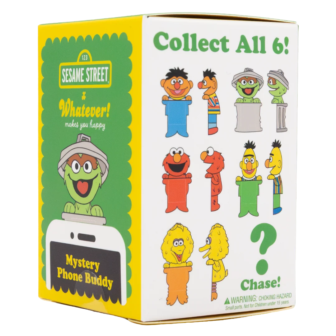Sesame Street x Whatever! Mystery Phone Buddy collectible box, featuring a white and yellow box with illustrations of various Sesame Street characters and the text 'Collect All 6!' and 'Mystery Phone Buddy'.