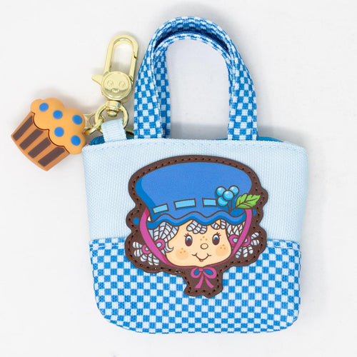 Collectible Strawberry Shortcake Besties mini tote featuring scented blind box charm