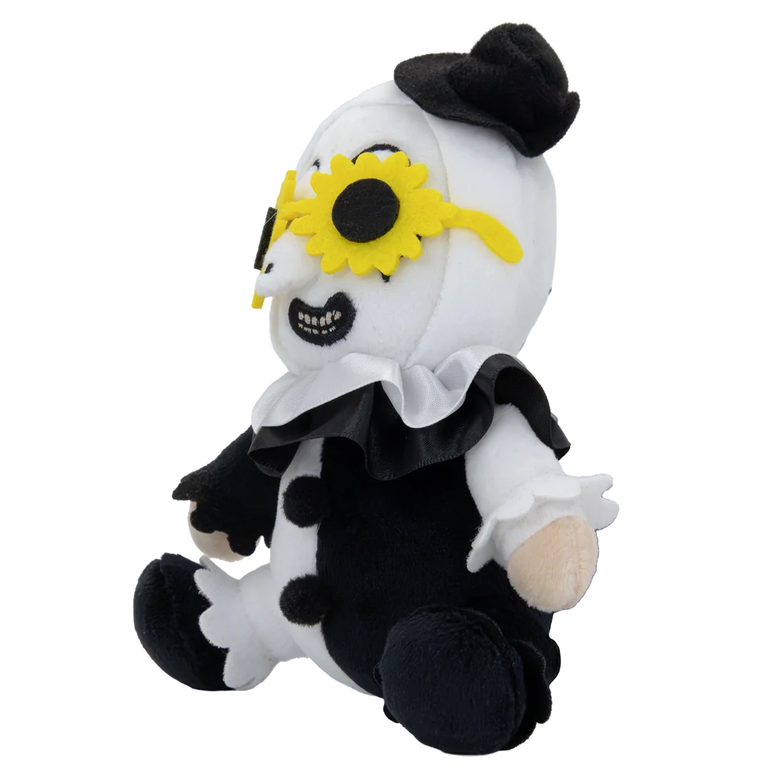 A plush toy character with a white and black clown-like outfit, a black top hat, and a large yellow sunflower over one eye, shown on a plain white background.