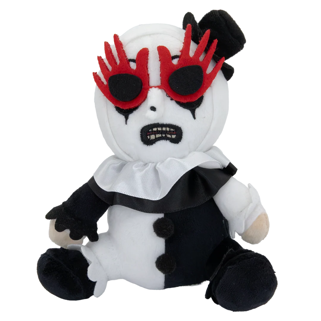 A plush toy doll dressed as a clown, featuring a white and black split outfit, red spiky sunglasses, and a black top hat, isolated on a white background.