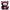 Black and pink plush toy with cat-like design on a white background