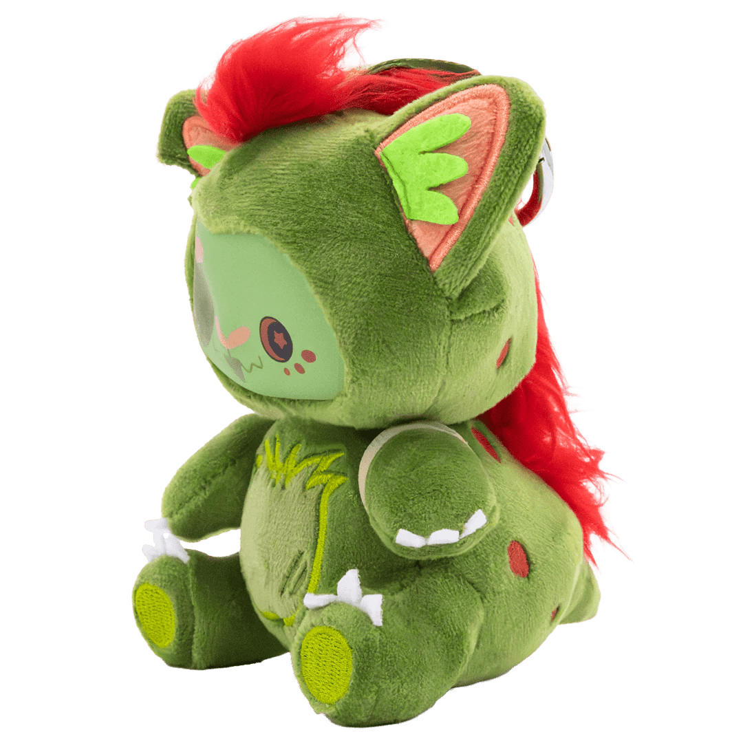 Green plush toy with red hair on a white background