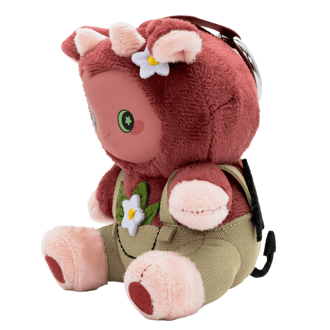 Plush toy with a backpack on a white background