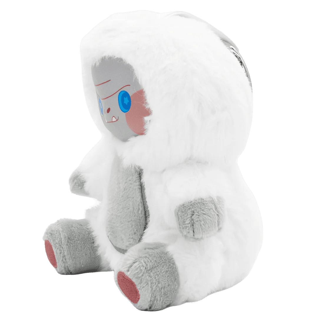 Plush toy resembling a character with a white body, gray limbs, and blue eyes on a white background