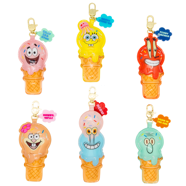 Set of colorful ice cream character bag charms on a white background