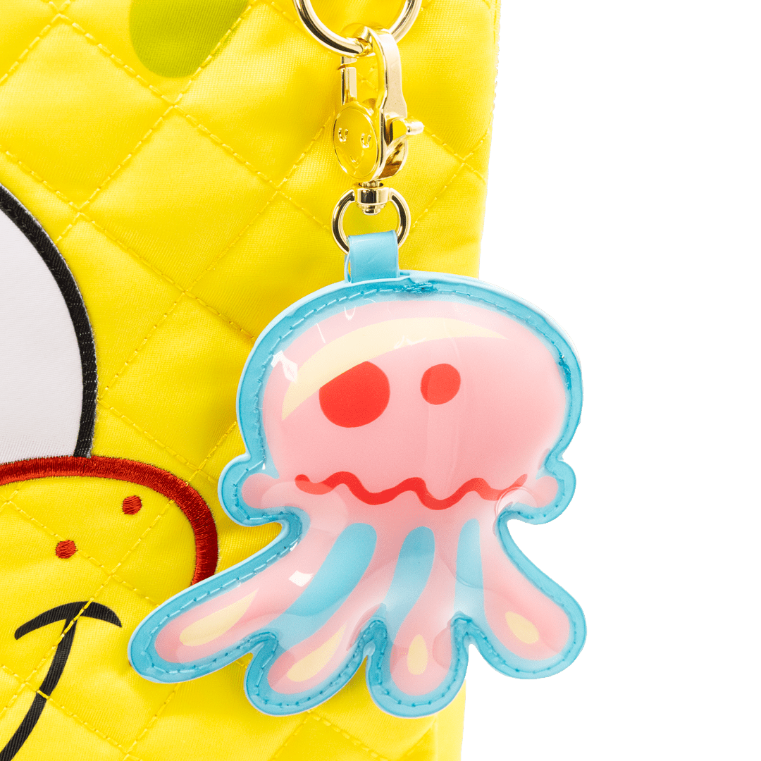 Pink jellyfish keychain on a yellow pineapple-shaped bag