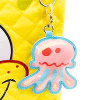 Pink jellyfish keychain on a yellow pineapple-shaped bag