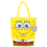 Yellow tote bag with a cartoon character face design on a white background