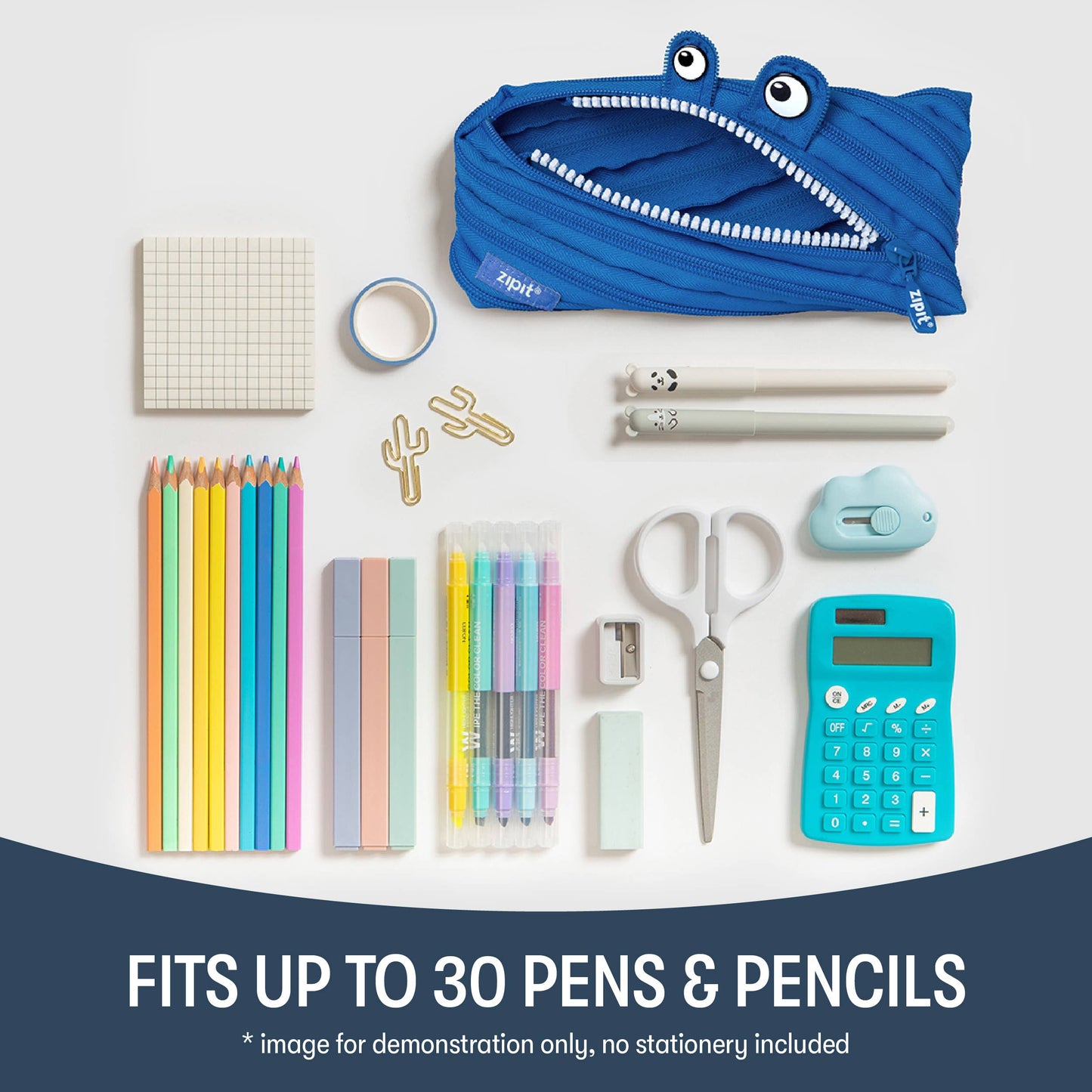 Blue shark-shaped pencil case with stationery items on a white background