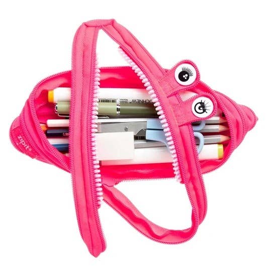 Pink pencil case with stationery items on a white background