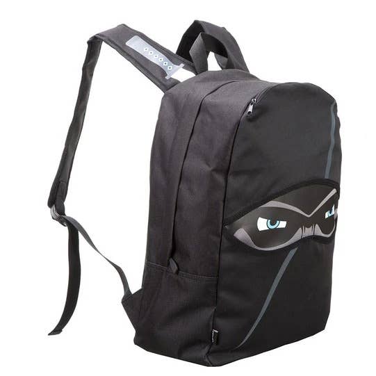 Black backpack with a design of eyes on a white background