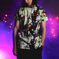 Person wearing a t-shirt with a colorful graphic design against a vibrant purple and pink background.